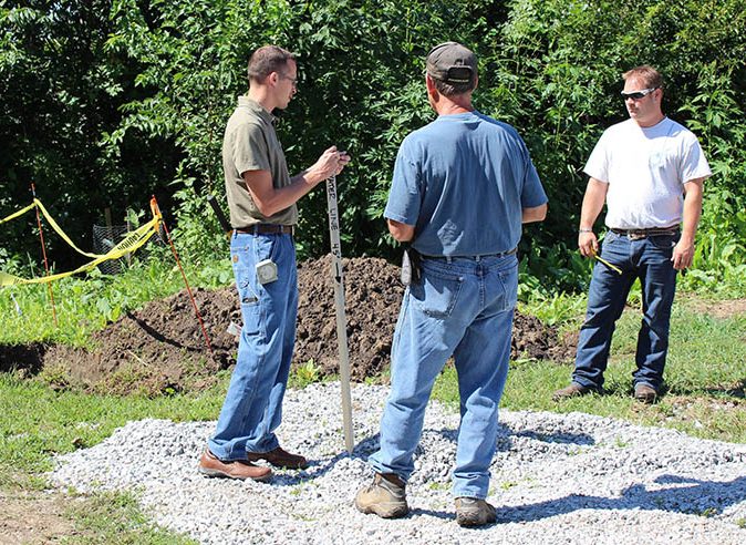ESD, OPPD Electrical Service Designer (ESD) Mark Krepela, left, visits with personnel at Vala's Pumpkin Patch regarding a new transformer that will be installed for a future construction project at the popular fall destination.