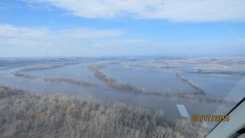 Flooded rivers converge in eastern Nebraska on March 17, 2019