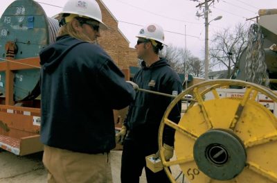 outage restoration process for OPPD involving underground cable wires on a spool