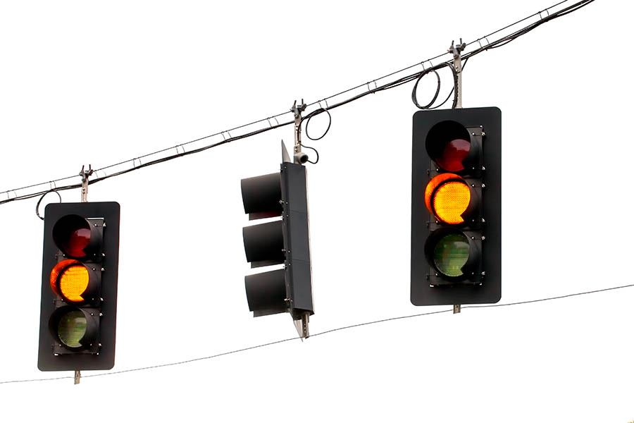 Overhead wire with three traffic signals, traffic light outages